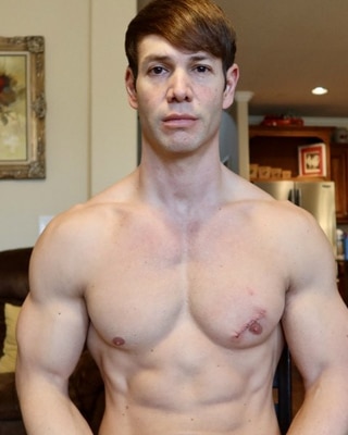 muscular man with chest scar