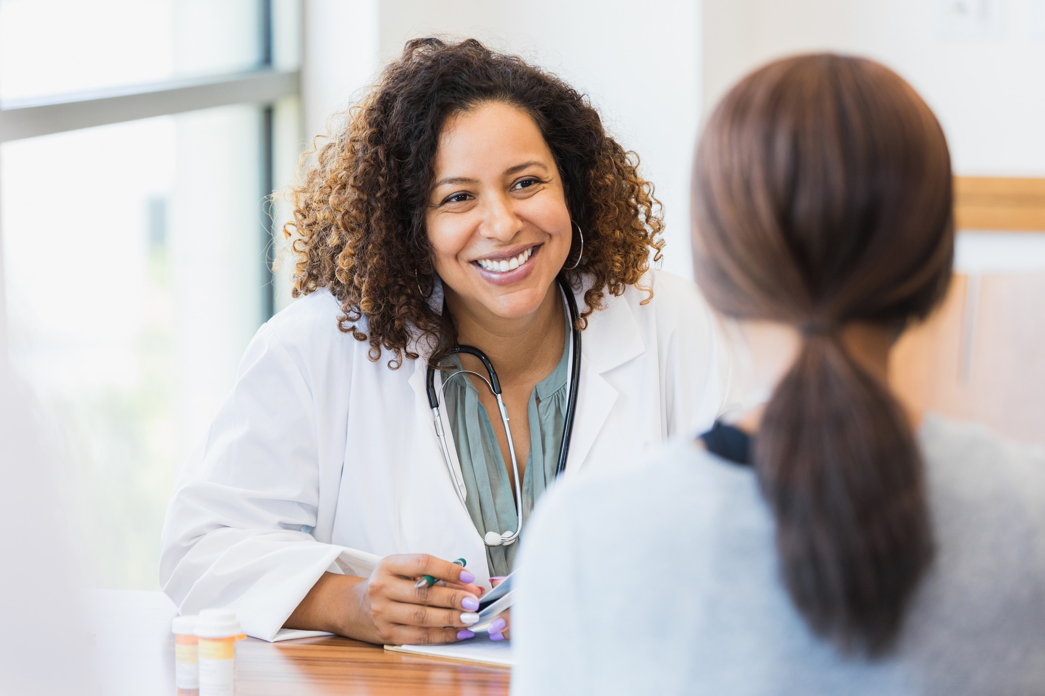 doctor talking with her patient